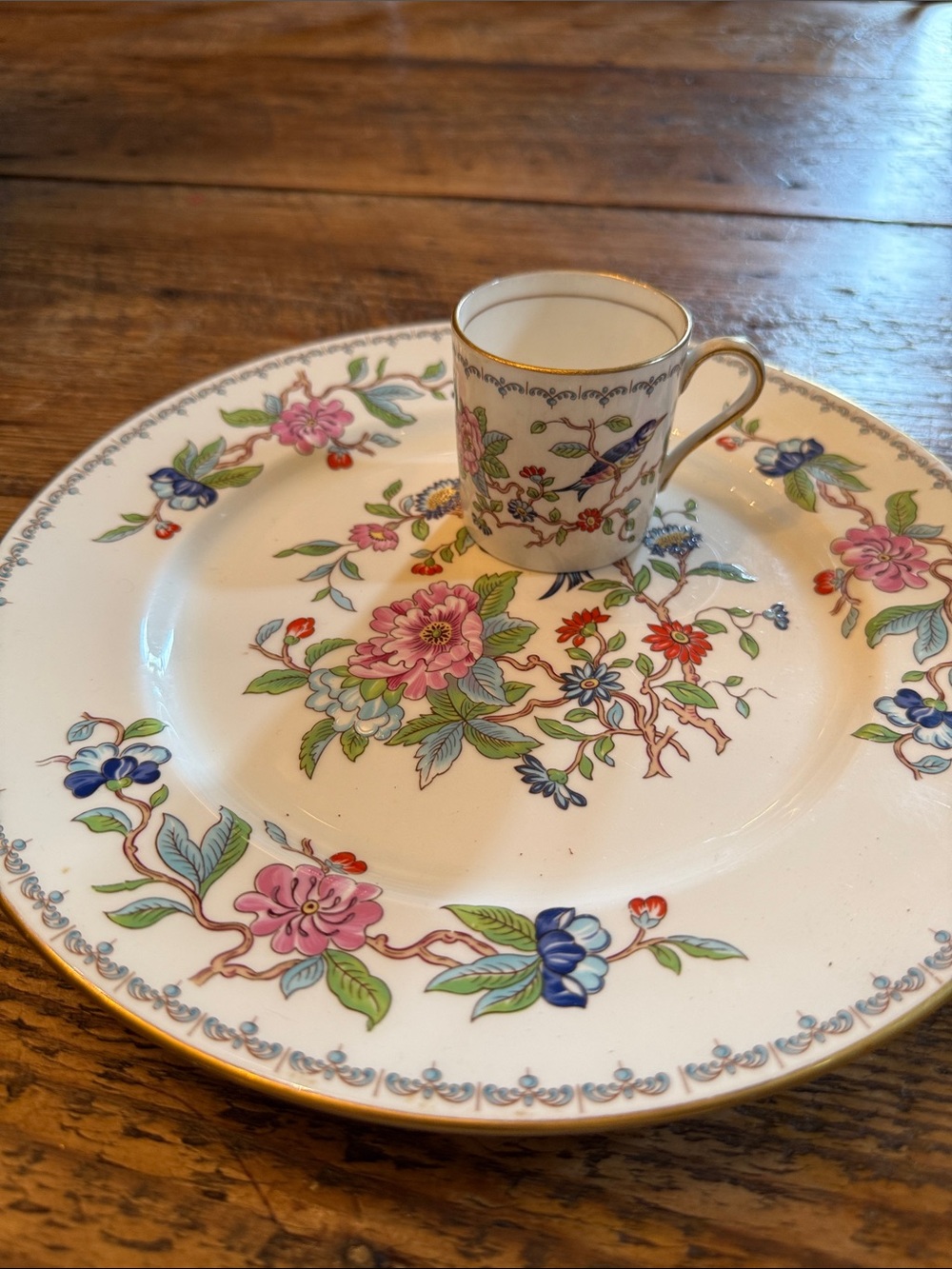 Pelmbroke .   Floral Porcelain Dessert Plate and Demitasse Cup -